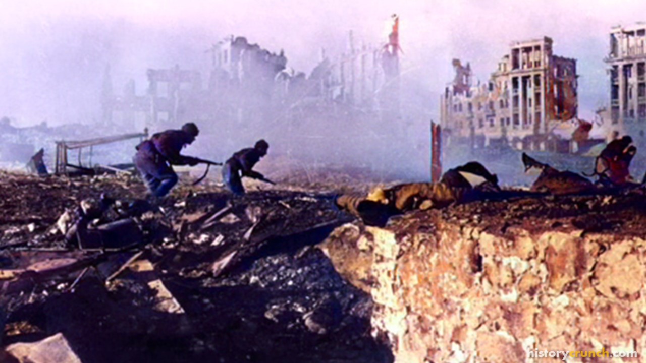 This photograph shows Soviet soldiers fighting in the ruins of Stalingrad during the winter of 1942 to 1943. The Battle of Stalingrad was a turning point in World War II, as Soviet forces surrounded and defeated a large German army there.