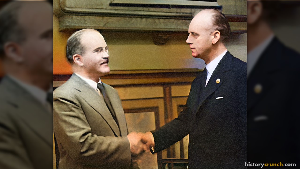 Molotov (left) and Ribbentrop at the signing of the pact. (Colorized and enhanced by historycrunch.com)