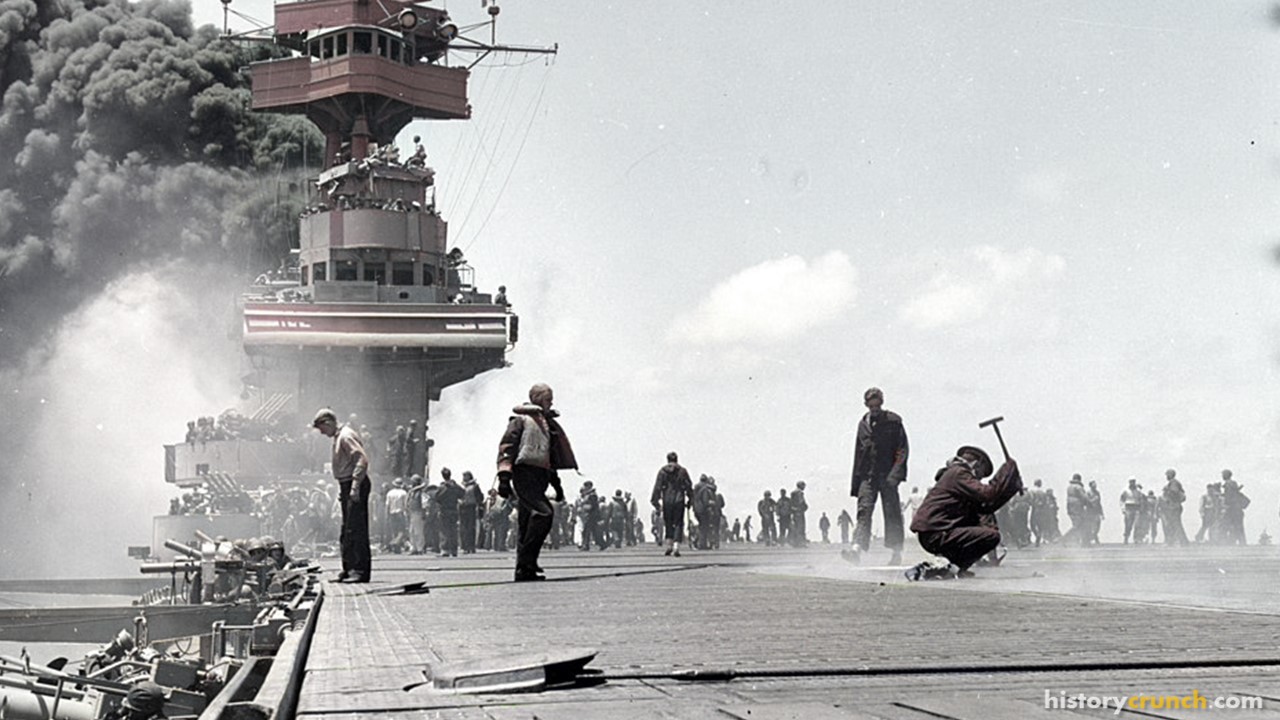USS Yorktown after being hit by three Japanese bombs on June 4th, 1942, during the Battle of Midway. (Colorized by historycrunch.com)