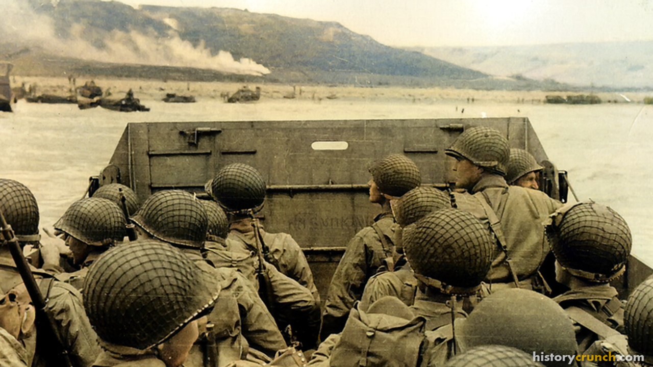 American troops approaching Omaha Beach during the events of the Normandy Invasion in June of 1944. (Colorized by historycrunch.com)