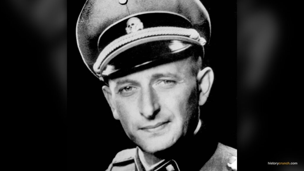 Adolf Eichmann, a senior SS officer who organized the deportation of Jews during the Holocaust, is pictured here in his SS uniform and officer's cap.
