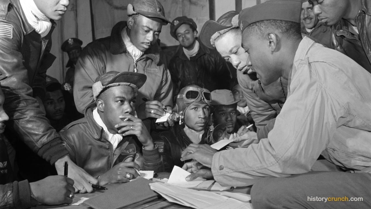 Tuskegee Airmen at a mission briefing during World War II.