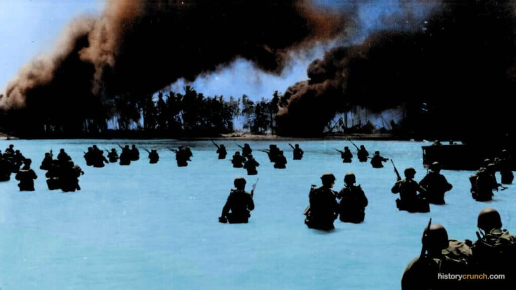 'US Army soldiers wave at Makin Atoll (35119484575)' by Cassowary Colorizations (2017). (Photo: Cassowary Colorizations, CC BY 2.0, via Wikimedia Commons)